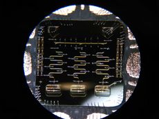 In this superconducting circuit studied in Alicia Kollár’s lab, the middle of the three rectangles along the bottom are junctions that hold quantum states that may each be used as a qubit. 