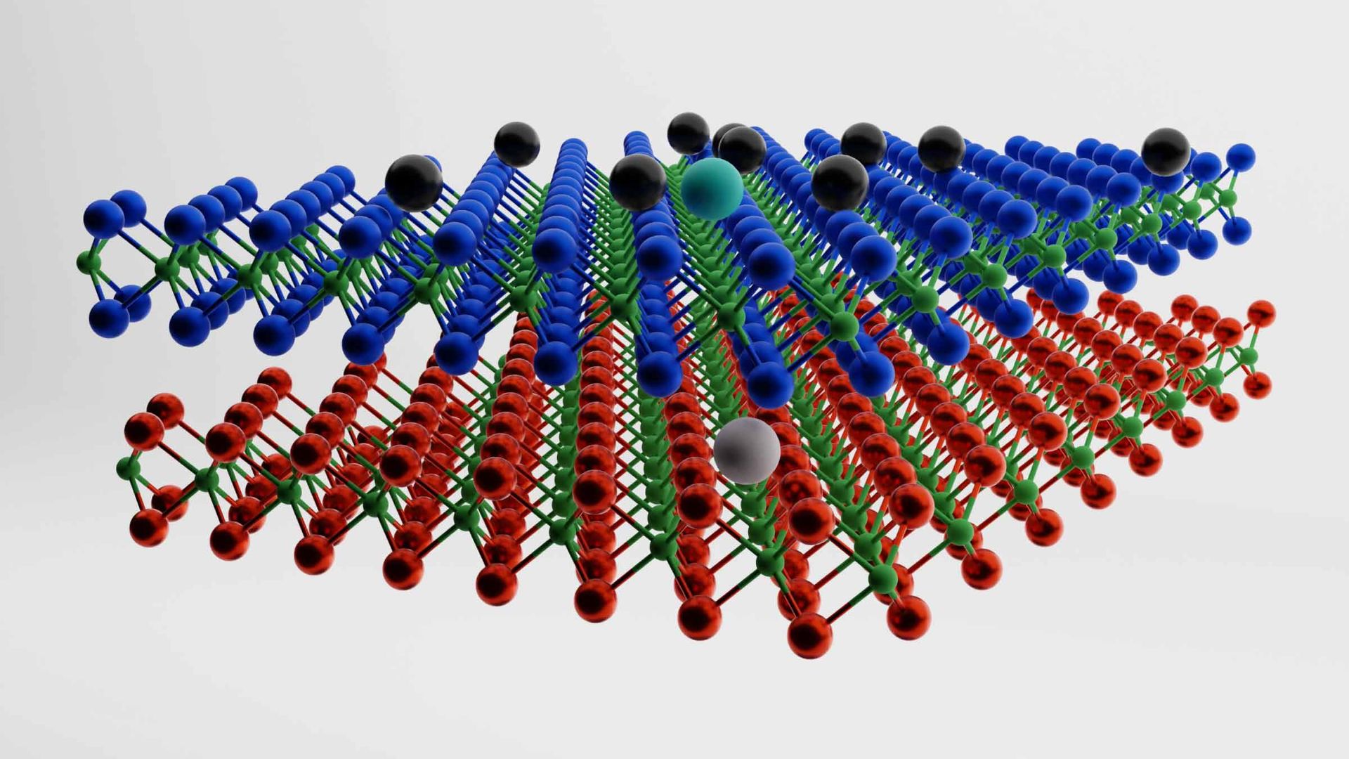two layers of a chemical structure lie above each other with black balls hovering on top. On the top layer, there is a cyan ball with a white ball in the corresponding layer below