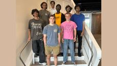 eight young men participating in the RQS REU summer 2026 program pose for the camera