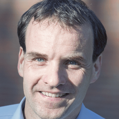 A headshot of Markus Greiner